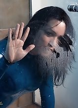 Bianka in sexy tight blue latex gets hard and horny on the shower